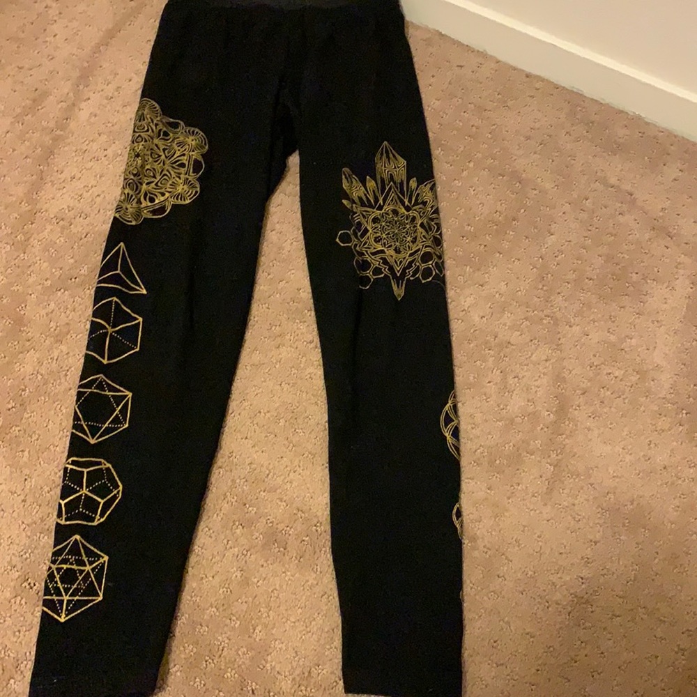 Hand crafted 95% cotton Black leggings with gold designs.